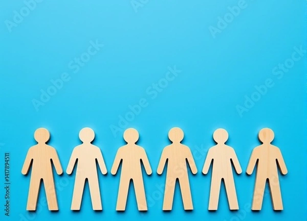 Obraz Wooden Human Figures in a Row on Blue Background Teamwork Concept Illustration