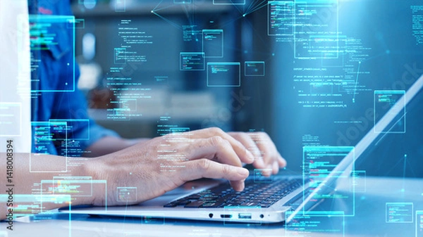 Obraz Close-up of hands typing on a laptop with holographic code and digital data interface overlays, symbolizing software development and coding.