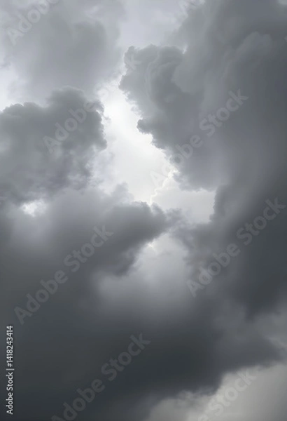 Fototapeta plane flying through a cloudy sky on a cloudy day