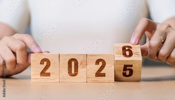 Fototapeta 2026 Budget Planning and Allocation Concept. Wooden block that changes from 2025 budget to 2026 budget. Business growth, goals, planning, Happy New Year; 2025 turning into 2026; goal setting