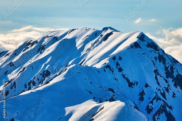 Fototapeta 冠雪の北アルプスの立山連峰の大日岳