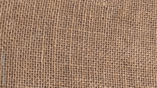 Fototapeta Burlap texture background. Banner beige textile linen tablecloth in full frame. Cloth texture background. Copy space. photo