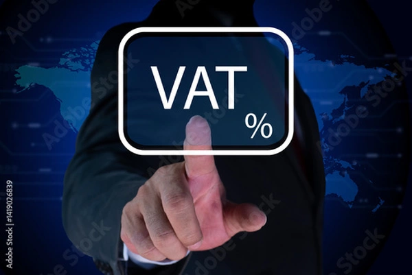 Fototapeta Businessman hand touching VAT on virtual screen. Concept of taxes payment optimisation business finance