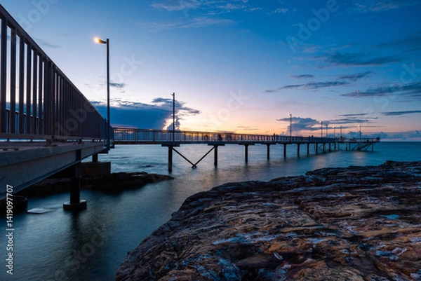 Fototapeta Sunset view of Nightcliff jetty, Darwin, Australia.