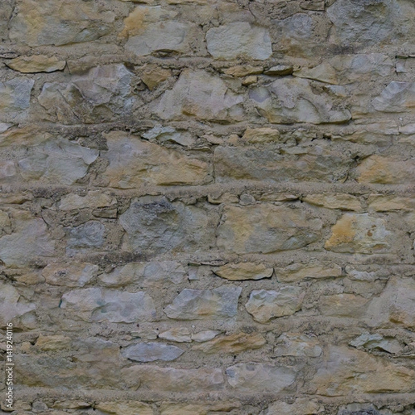 Fototapeta An old, gray wall made of stone and cement. Grey, stone background. Ancient ruins. Stone texture. Seamless image. Seamless image.