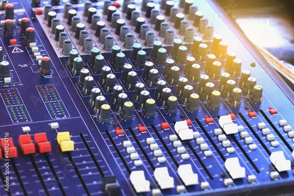 Fototapeta Mixer level control knob in the control room and sound recorder.