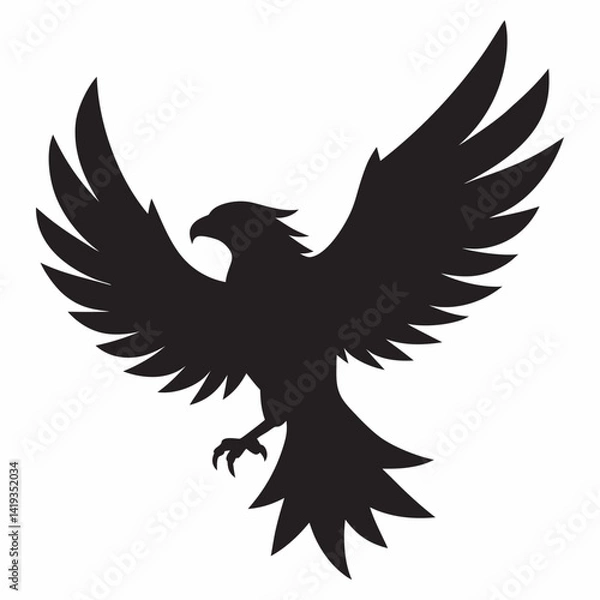 Fototapeta A eagle soaring high wings wide and tail feathers trailing silhouette