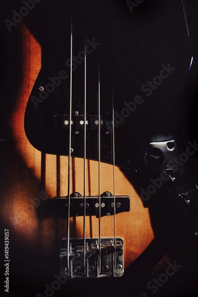 Fototapeta Details of a four-string bass guitar