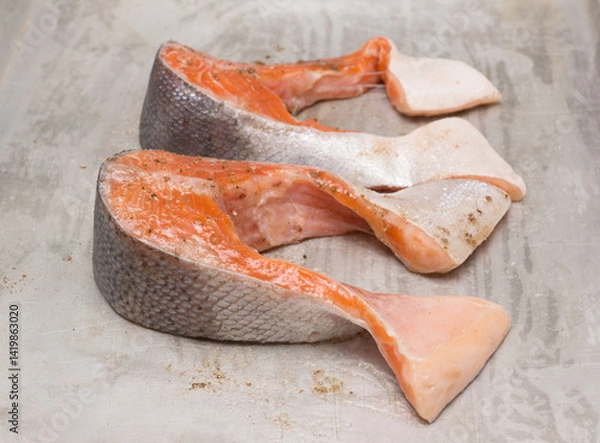 Fototapeta salmon fillets baked until crispy with parsley