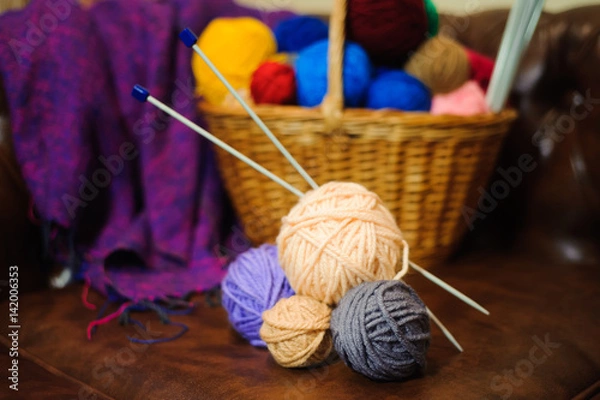 Obraz color knitting and balls in the basket