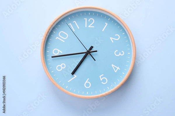 Fototapeta Close-up of a wall clock. The concept of time and work time is valuable for life, Alarm clock stopped. photo in a coloured background