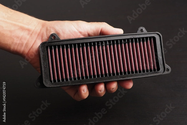 Fototapeta New air filter for scooter moped in hand. 