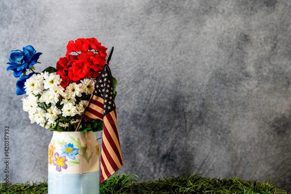 Fototapeta red white and blue spring flowers with American flag on grey background with room for copy