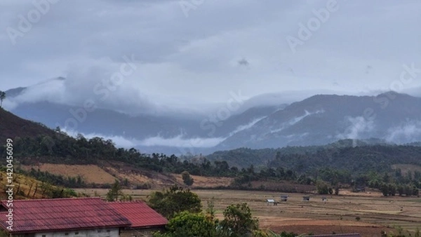 Fototapeta landscape with mountains and clouds
