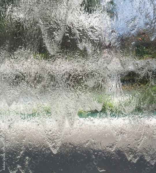 Fototapeta Waterfall on a window