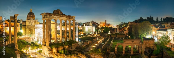 Fototapeta Ruins of Roman forum at night in Rome. Italy with Inscription "Senatus Populusque Romanus incendio consumptum restituit" - The Senate and People of Rome restored what had been consumed by fire