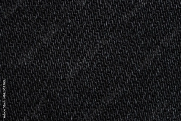 Fototapeta Texture of black denim fabric as background, top view