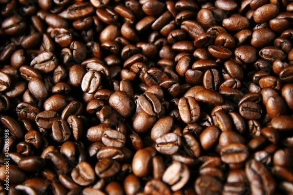 Fototapeta Closeup of roasted coffee beans after roasting in a drum type coffee roaster 2/2