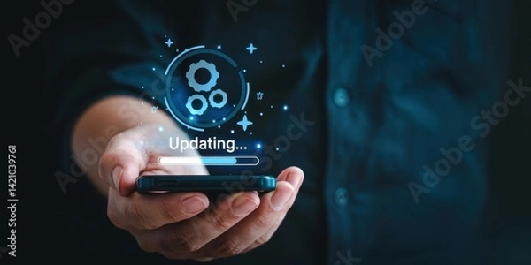 Fototapeta Mobile phone displaying an update in progress.