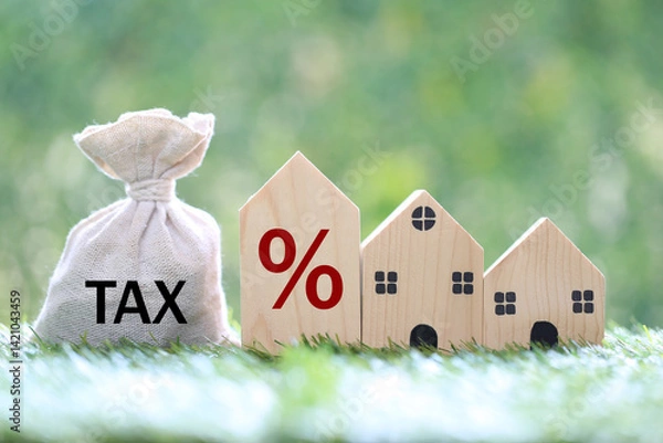 Obraz Estate tax, Model house and percentage symbol icon and stack of coins money on natural green background,Business investment and Property tax concept