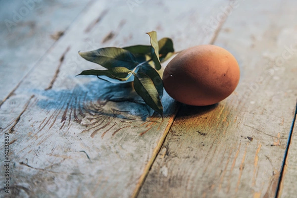 Obraz Easter farm eggs on rustic wooden table. Angle view.