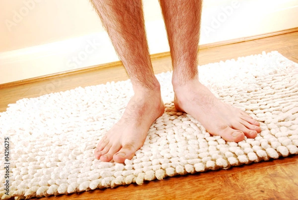 Obraz Man's legs on a bathmat