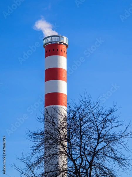 Obraz Red and White Smokestack Against Blue Sky