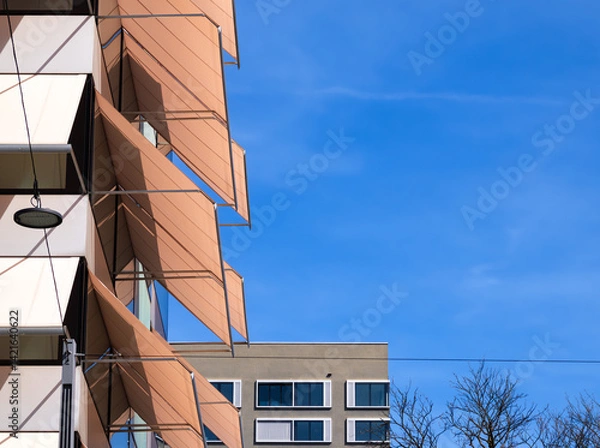 Obraz Modern Architectural Facade with Angular Panels