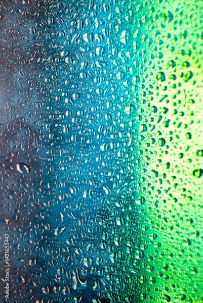 Fototapeta background texture for background bright green grass color and blue color with shimmering elements and flowing drops on glass, beautiful bright background with overflows and gradient