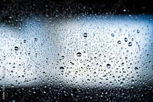 Fototapeta background texture for background black, white and light blue with shimmer elements and flowing drops on glass, with overflows and bokeh, beautiful bright background with overflows and gradient