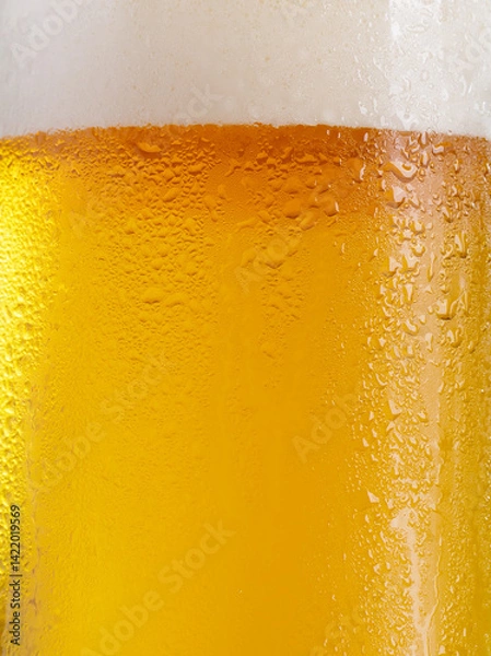 Obraz glass of beer with bubble and froth as background