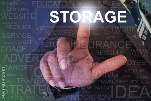 Fototapeta Businessman touching storage button on virtual screen