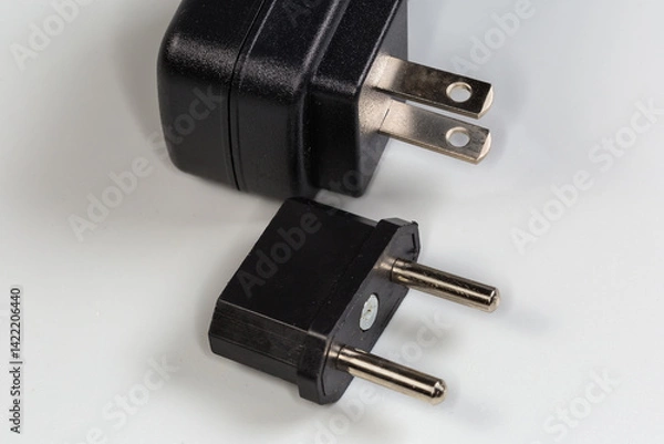 Fototapeta AC adapter American plug to Euro plug against power unit