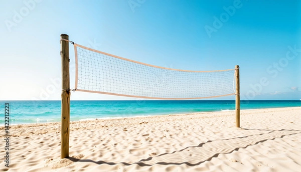 Fototapeta Beach volleyball net against a sunny sky and ocean background  