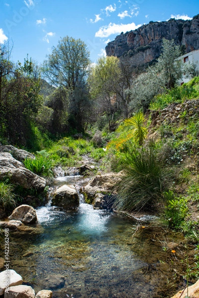 Fototapeta Cascading waterfalls in a mountain stream in the Hondares ravine