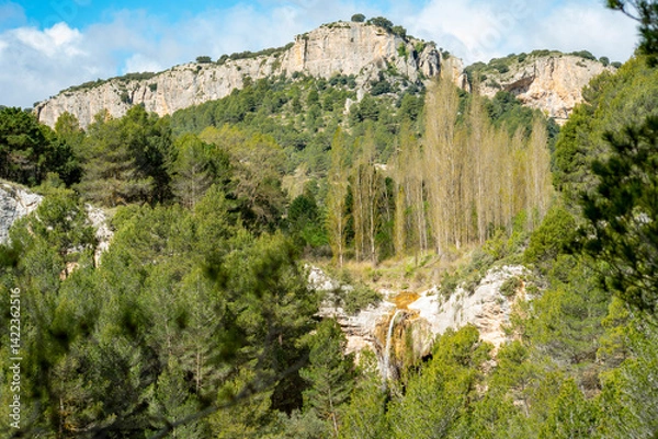 Fototapeta Cascading waterfalls in a mountain stream in the Hondares ravine