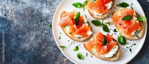 Fototapeta Appetizing Open Faced Sandwiches with Smoked Salmon Cream Cheese and Fresh Basil on a White Plate Culinary Delight