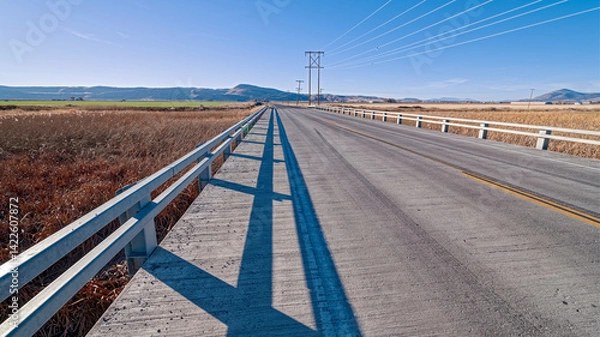 Obraz Late afternoon shadows cast by the rails along the Lost River Bridge near Tulelake, California, USA