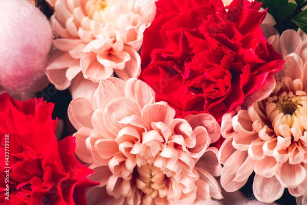 Obraz Close-up of a beautiful bouquet with chrysanthemums and carnations on a neutral background. Bouquets and flowers. Selective focus.