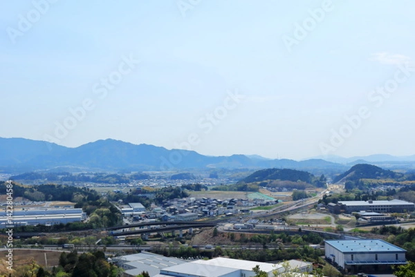 Obraz 滋賀県　栗東市の日向山の南方の風景と延伸する道路