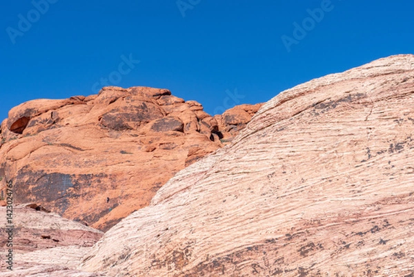 Fototapeta Aztec Sandstone(Jurassic) geological formation. weathering. Scenic Loop Dr, Red Rock Canyon National Conservation Area, Las Vegas, Clark County, Nevada. Mojave Desert. Basin and Range Province