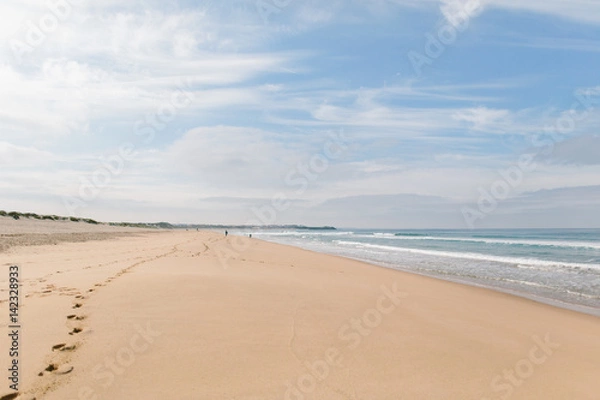 Obraz Fußabdrücke im Sand am Meer