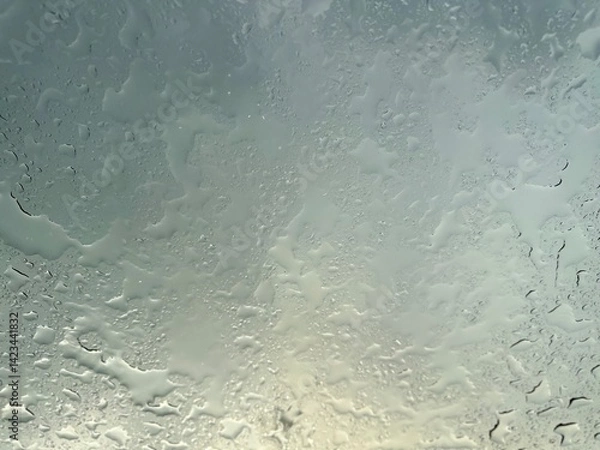 Fototapeta Rain falling through the glass, The sight of rain from the sky, Rain falling through clear glass.