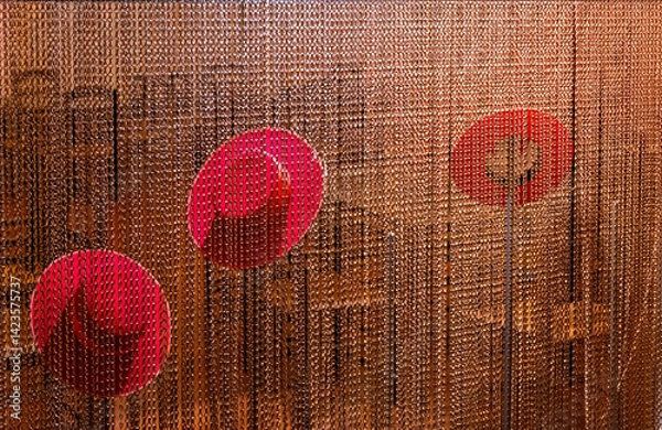 Obraz Red Andalusian flamenco hats behind a decorative metallic red curtain.