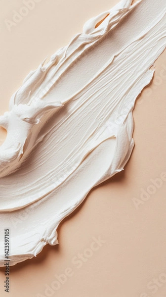 Obraz Close-up of smooth white cosmetic cream or makeup foundation smeared on a soft beige background. Generative AI