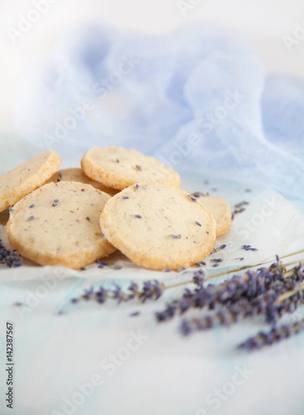Fototapeta Aromatic lavender handmade cookies on wooden background with copy space