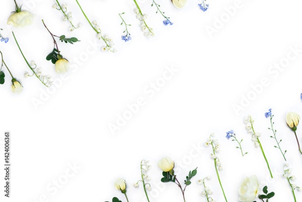 Fototapeta Flowers white small roses, white flowers Lily of the valley ( Convallaria majalis ) and blue wildflowers forget-me-nots on a white background with space for text. Top view, flat lay
