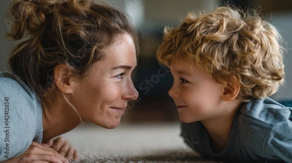 Fototapeta Two individuals share a heartwarming moment on the floor, leaning close while smiling and playing together. Their connection radiates warmth in a cozy living room atmosphere.