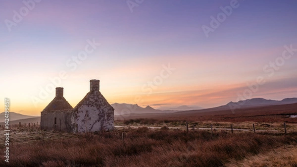 Fototapeta Sunrise behind the Moine House. A ruin of a stone cottage in the remote moorland in Sutherland in the far north of the Scottish Highlands.
