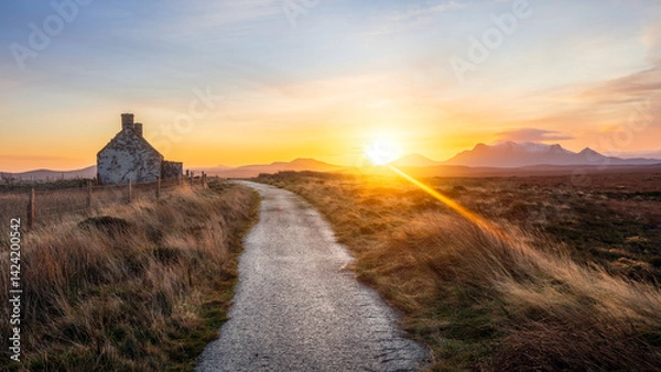 Fototapeta Sunrise behind the Moine House. A ruin of a stone cottage in the remote moorland in Sutherland in the far north of the Scottish Highlands.